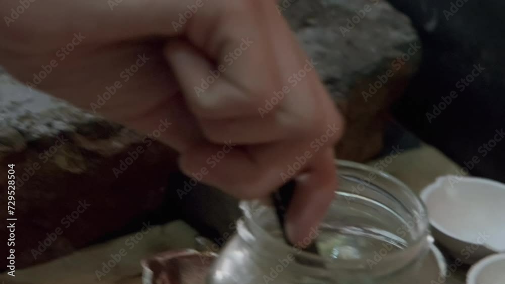 Goldsmith putting red-hot silver ring blank into cold water. Jewelry handicraft Goldsmith putting red-hot silver ring blank into cold water. Jewelry handicraft