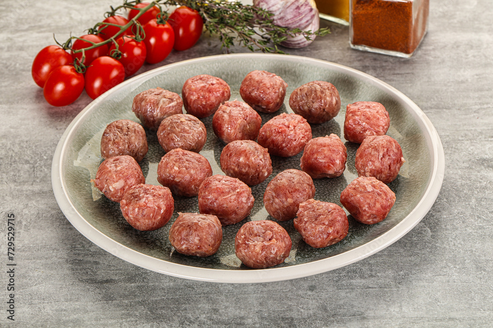 Uncooked raw beef meatball minced