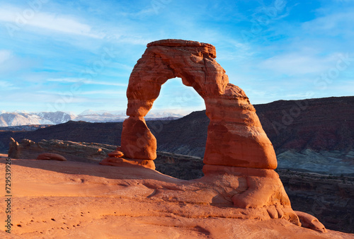 View of the famous Tender Arch, a symbol of Utah and a popular scenic tourist attraction, in the evening light at sunset in summer, Arches National Park, Moab, Utah, USA