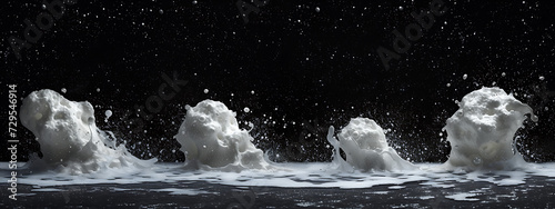 four samples of white foam with a black background in