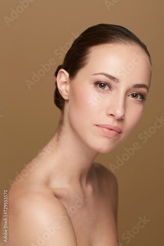 Skincare, beauty or portrait of natural woman in studio isolated on brown background for pride or wellness. Smooth face, body cosmetics or confident model or healthy female person with shine or glow