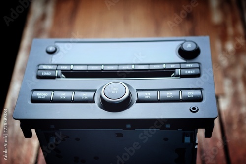Frontal view of a black 2009 luxury car digital radio CD  photo