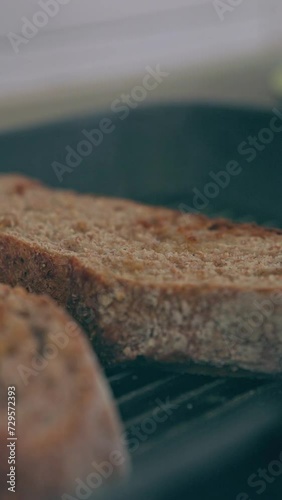 Hot and steaming freshly baked wholegrain wheat bread on a very close plane