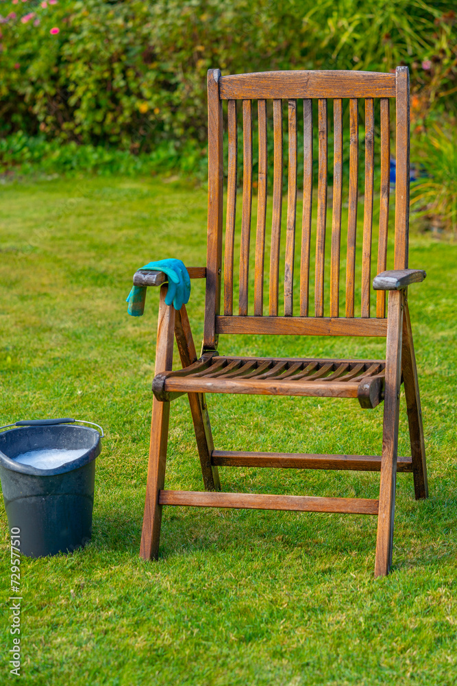 Wood furniture cleaning, wooden garden chair - care and maintenance of wood with water and mild detergent Wood furniture cleaning, wooden garden chair - care and maintenance of wood with water and mild detergent