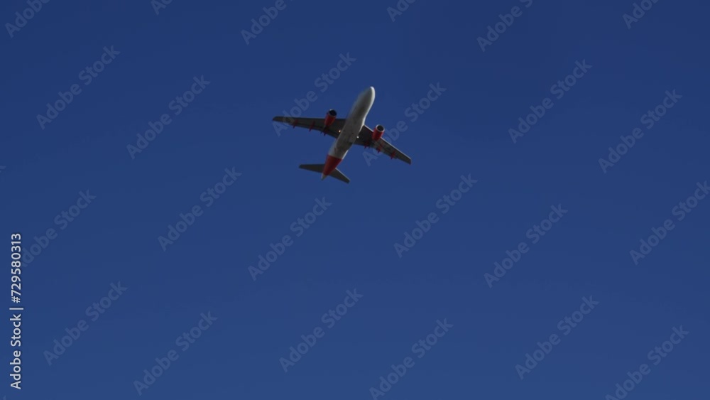 Airplane fly away though the blue sky. Large passenger airplane is taking off against the skies. Airliner landing on landing strip at airport Airplane fly away though the blue sky. Large passenger airplane is taking off against the skies. Airliner landing on landing strip at airport