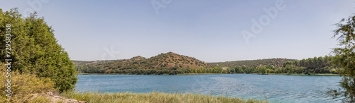Lagunas de Ruidera located in Albacete Spain, with turquoise waters and blue sky