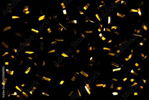 Gold Confetti On A Black Background