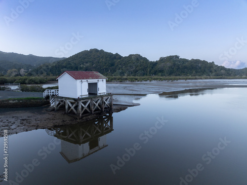 Aerial: Big Omaha Wharf, Whangateau, Auckland, New Zealand. photo