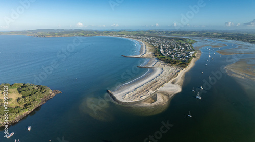 Aerial: Harbour and sandspit in Omaha Beach, Warkworth, New Zealand. photo