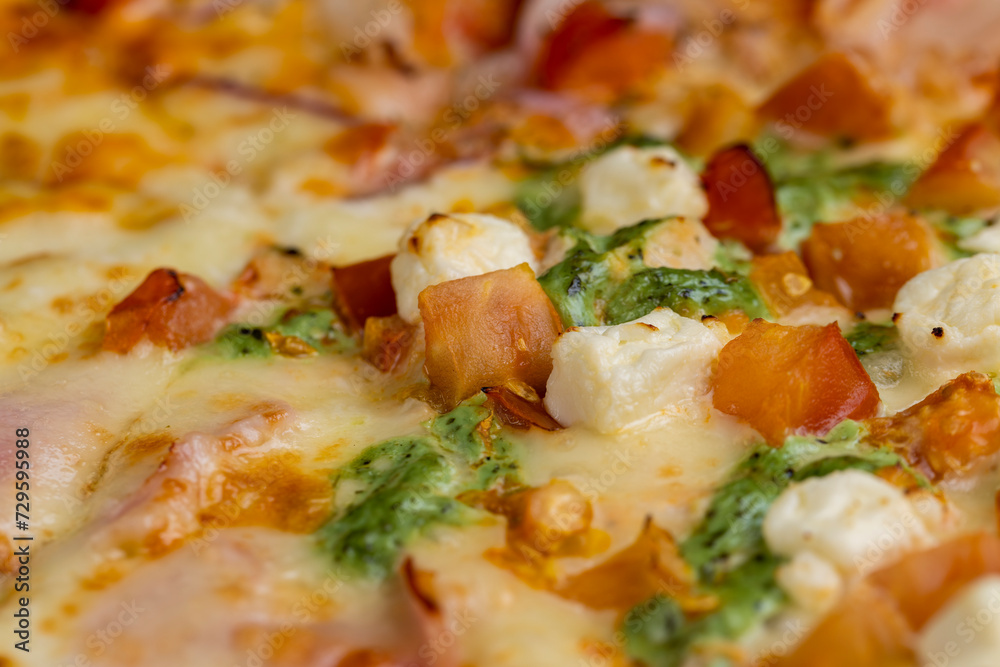 pizza using a large number of different ingredients close-up pizza using a large number of different ingredients close-up