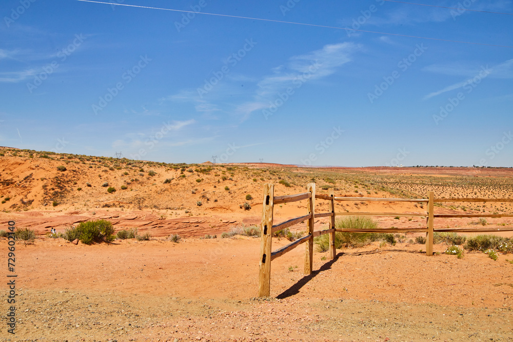 Rustic Wooden Fence in Vast Arizona Desert Landscape