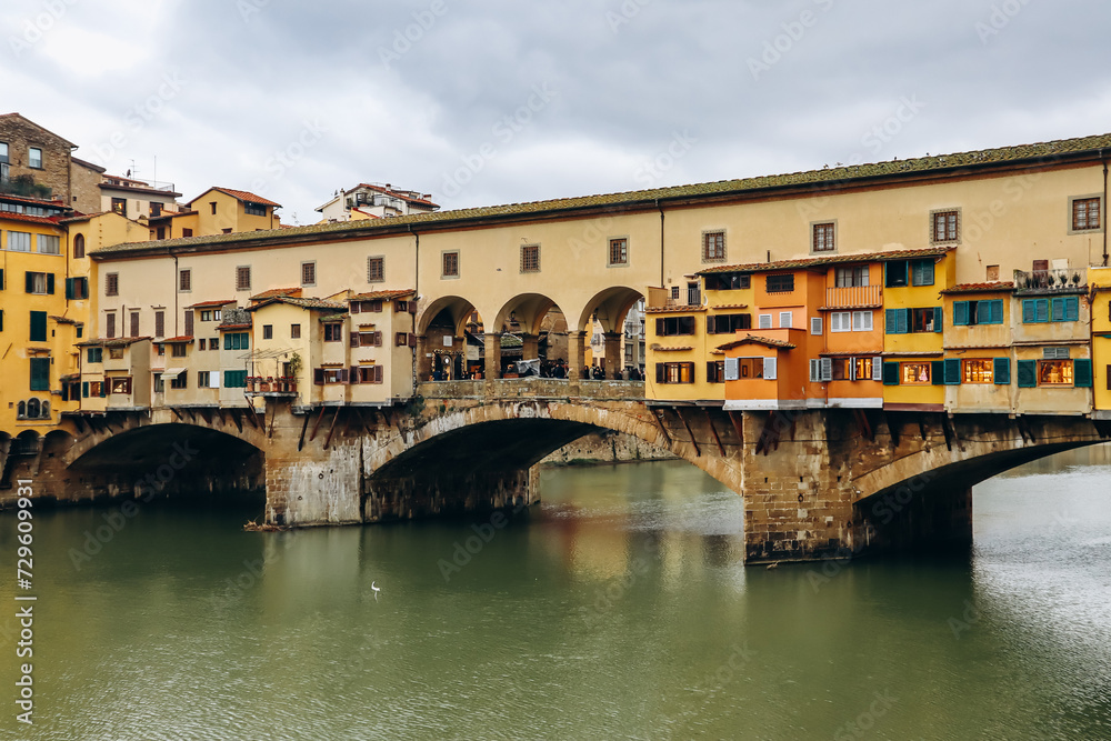 The Ponte Vecchio, a medieval stone closed-spandrel segmental arch bridge over the Arno, in Florence, Italy The Ponte Vecchio, a medieval stone closed-spandrel segmental arch bridge over the Arno, in Florence, Italy