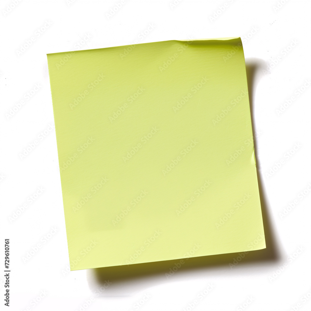 A green empty adhesive note on a white background A green empty adhesive note on a white background