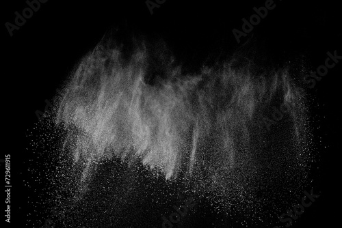 Fototapeta Naklejka Na Ścianę i Meble -  Abstract white dust on black background. Light smoke texture. Powder explosion. Splash water overlay.	
