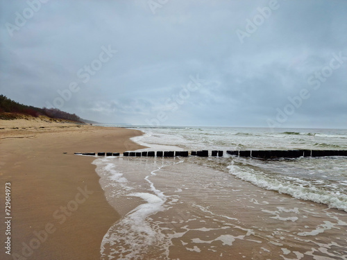 Sand beach at Baltic Sea. Miedzywodzie, Poland photo