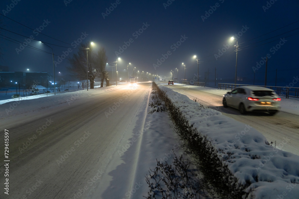 A car on a winter road, moving