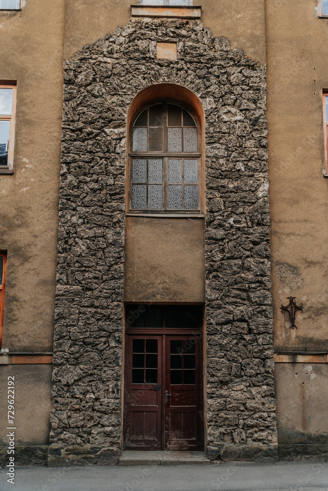 Fototapeta premium old wall with windows and doors