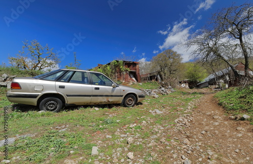 Old Korean car left aside among the agricultural and livestock facilities of a farmland in Elsani village. Ohrid-North Macedonia-305