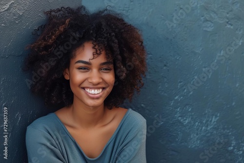 Cheerful young african american woman Relaxed posture Genuine smile.