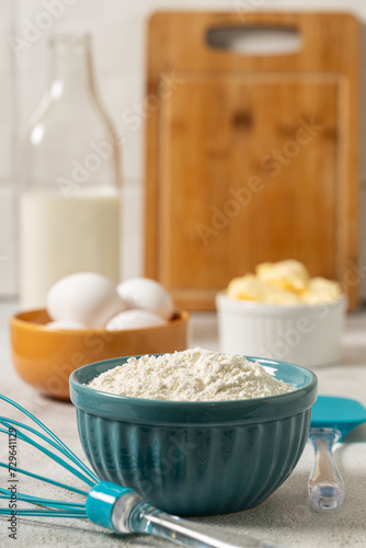 Ingredients to prepare cake. Wheat flour  eggs  butter and milk.