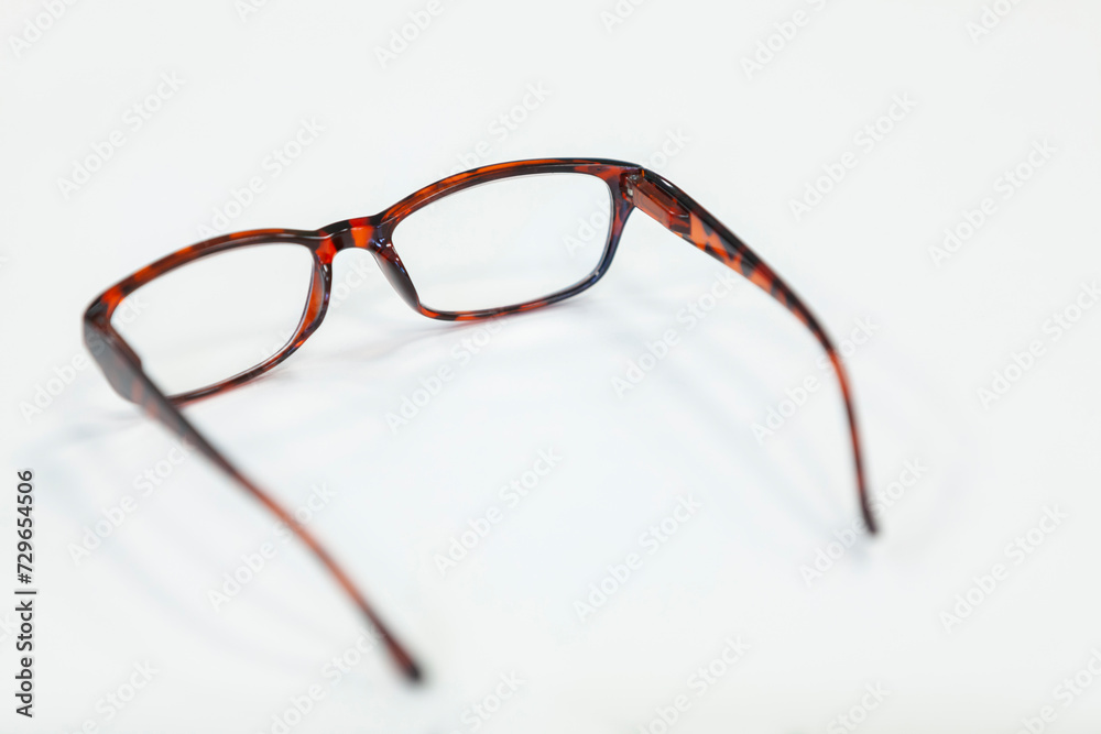 Glasses on a white background. Copy space, selective focus.