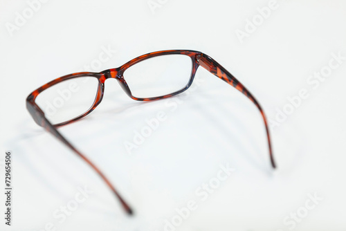 Obraz na płótnie Glasses on a white background. Copy space, selective focus. w salonie