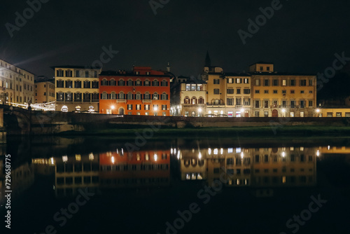 Embankment of Arno River at night  in Florence  Italy