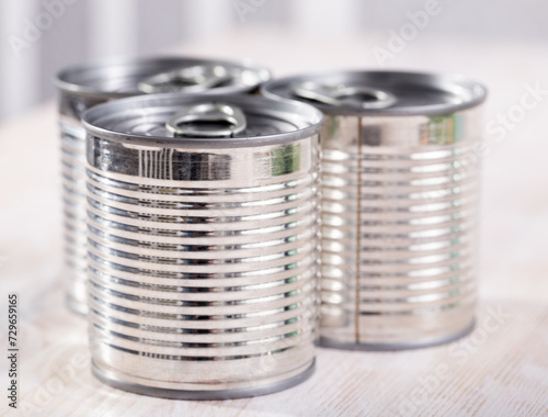 Canned food, closeup view of closed silver tin can
