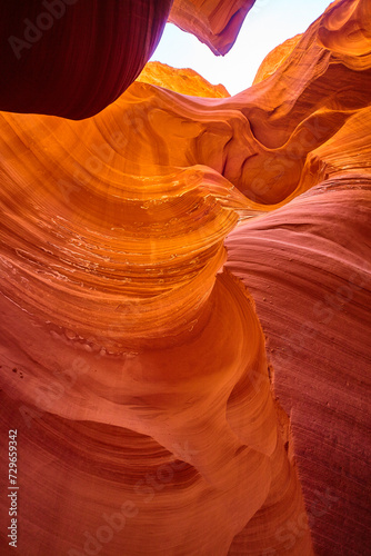 Antelope Canyon Beauty: Vibrant Striated Walls and Sky View