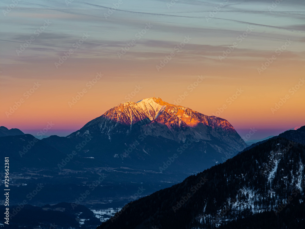 Snowy Dobratsch, in Villach, Austria in Winter Sunset Lights