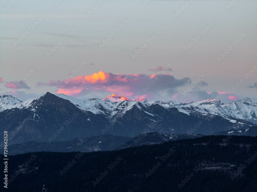 Sunset in the Austrian Alps, in stunning orange purple lights