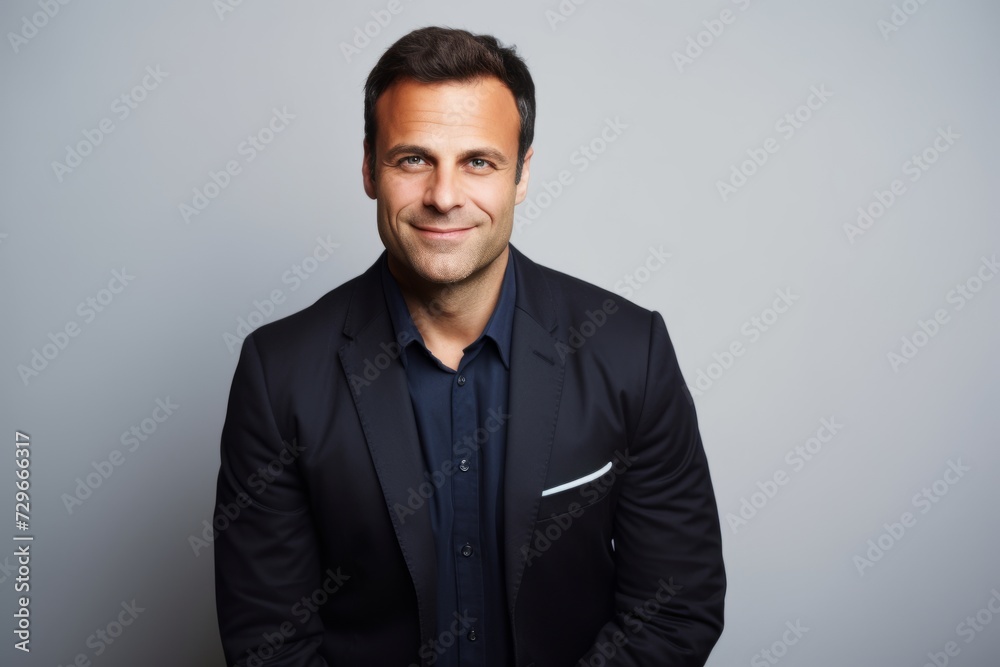 Portrait of a handsome businessman in a suit. Studio shot. Portrait of a handsome businessman in a suit. Studio shot.