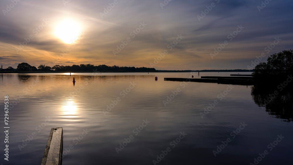Sunset over Hickling Broad, Norfolk Broads, UK Sunset over Hickling Broad, Norfolk Broads, UK