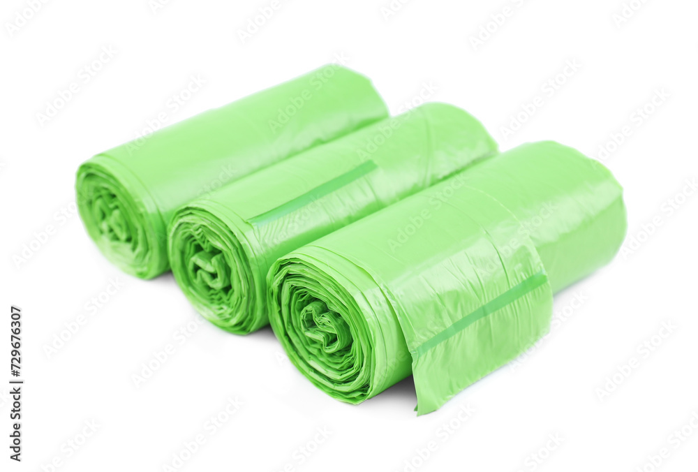 Rolls of light green garbage bags isolated on white Rolls of light green garbage bags isolated on white