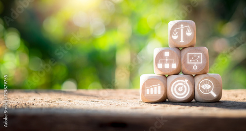 Fotografi Balanced Scorecard concept, Wooden block on desk with balanced Scorecard icon on virtual screen