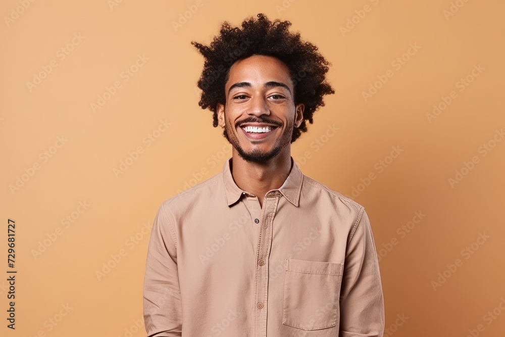 Portrait of a smiling african american man on a brown background Portrait of a smiling african american man on a brown background