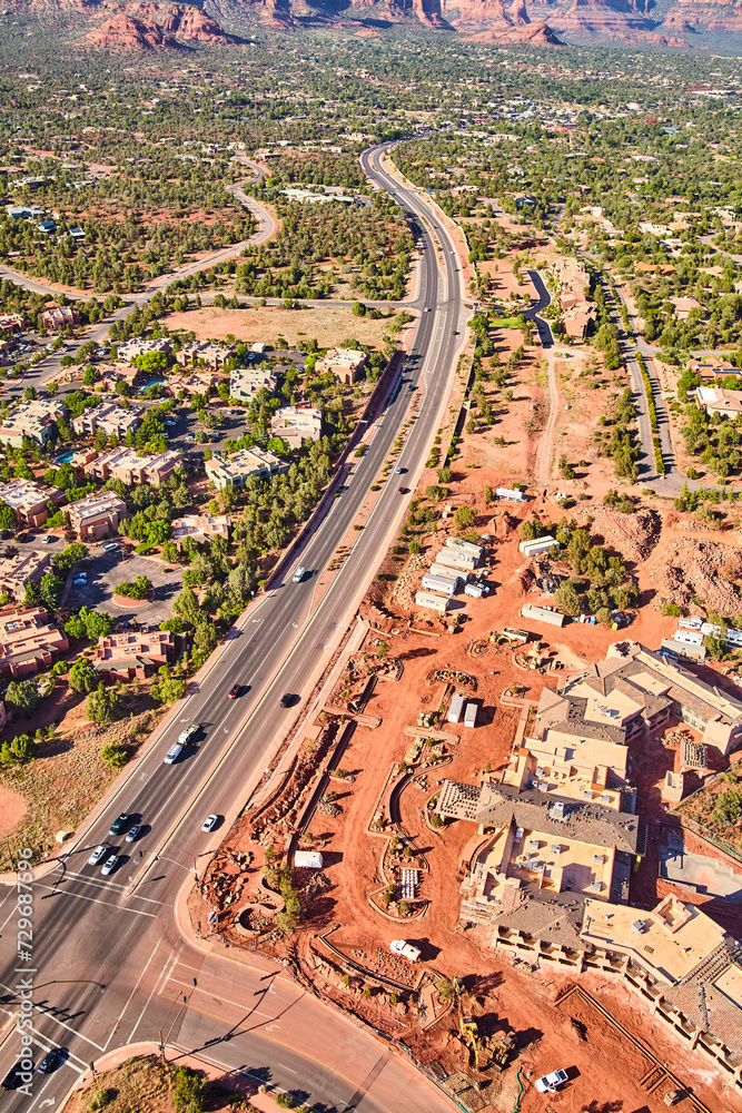 Aerial View of Desert Highway and Suburban Expansion in Sedona