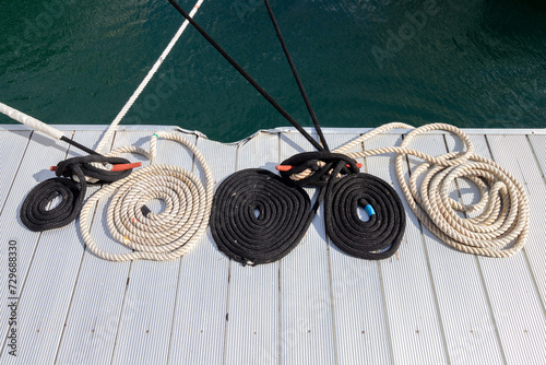 Ropes coiled on a dock © Lynda