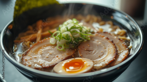 Miso ramen from Japan featuring tender pork slices, a soft-boiled egg, and fresh spring onions