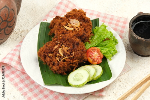 Gepuk Daging or Empal Daging.is an Indonesian Sweet and Spicy Fried Beef Dish.This Dish is Commonly Popular in Java Island.originally from West Java. photo