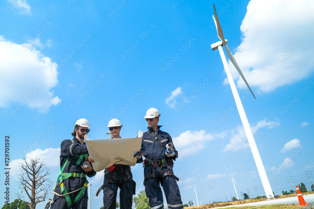 engineer working in fieldwork outdoor. Workers check and inspect construction and machine around building project site. Wind turbine for electrical of clean energy and environment sustainable. engineer working in fieldwork outdoor. Workers check and inspect construction and machine around building project site. Wind turbine for electrical of clean energy and environment sustainable.