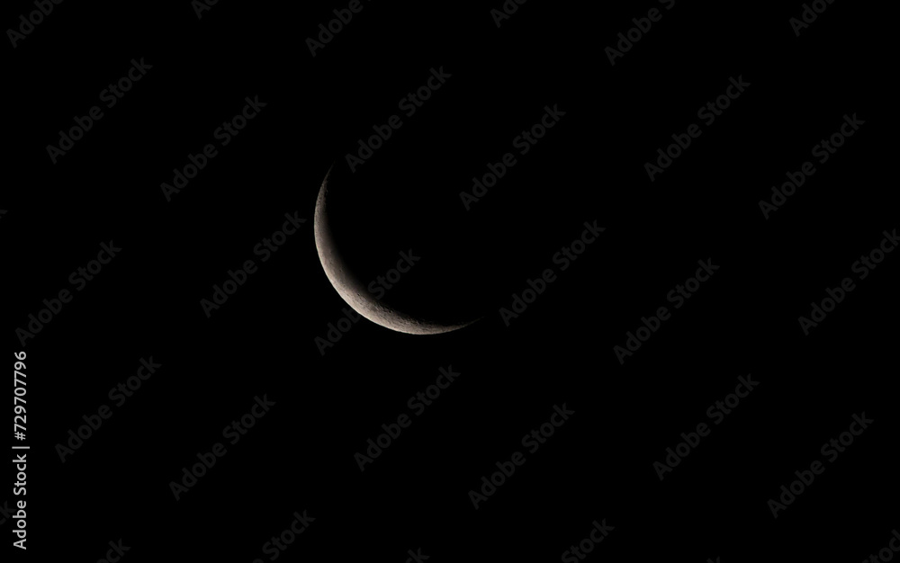 Half moon in the dark night sky. Close-up view. Half moon in the dark night sky. Close-up view.