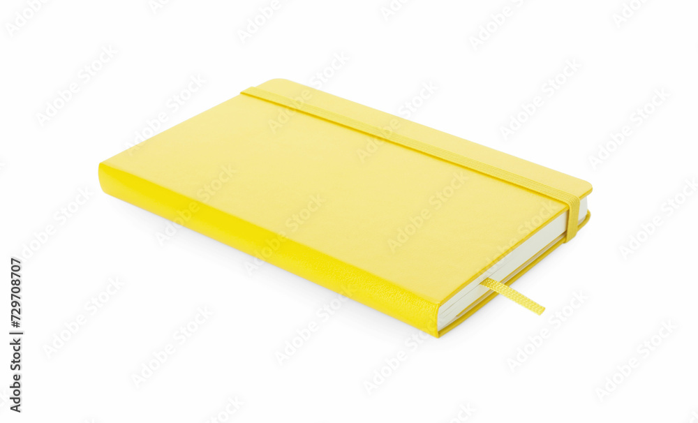Closed notebook with blank yellow cover isolated on white