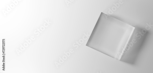 白背景に透明な立方体のガラスの台座。コピースペース。俯瞰。3D（横長） photo