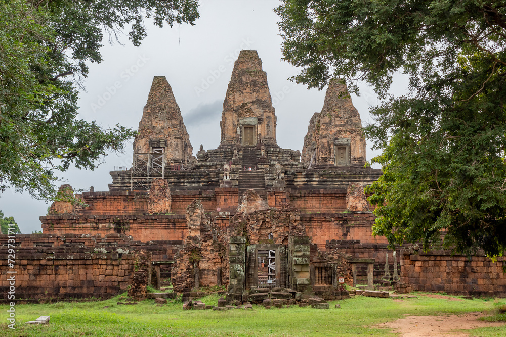Building stone red brick exterior of the Pre Rup Temple complex in the green forest of Seim Reap. Angkor Wat historical site, Cambodia