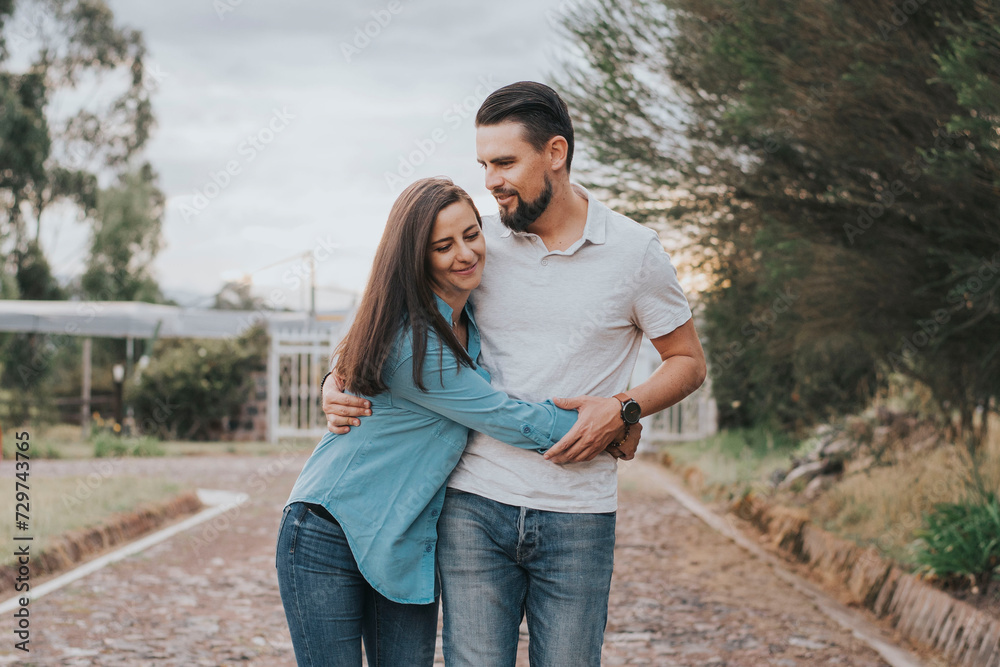 Couple hugging and having a good time Couple hugging and having a good time