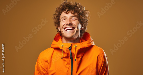 Bright Delight Man in Orange Feeling the Joy of the Moment © Dinaaf