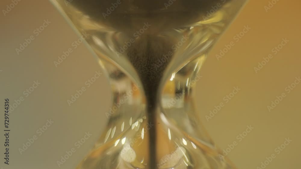 Macro close up video of sand timer running down