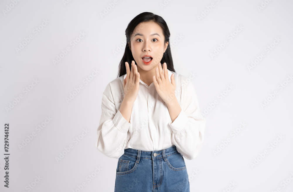 Portrait of young Asian businesswoman posing on white background Portrait of young Asian businesswoman posing on white background