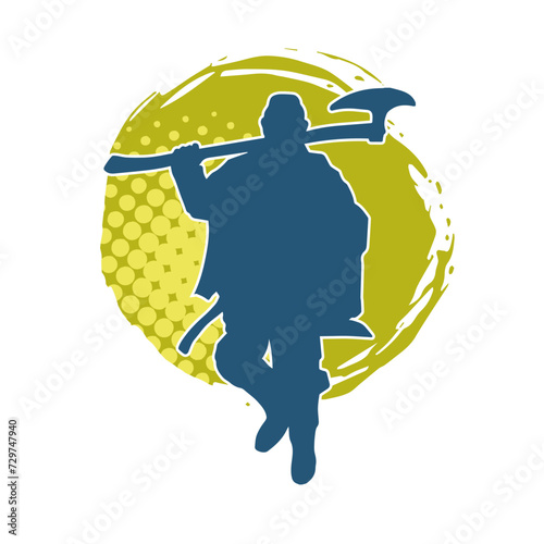 Silhouette of a male warrior carrying broad bladed war axe. Silhouette of a viking warrior with bearded axe weapon in action pose.